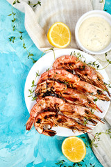Grilled big tiger shrimps prawns on white plate