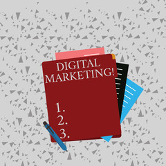 Word writing text Digital Marketing. Business concept for market products or services using technologies on Internet Colorful Lined Paper Stationery Partly into View from Pastel Blank Folder.