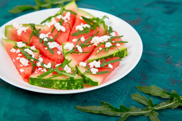 Fresh summer watermelon salad with feta cheese and arugula