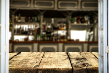 Desk of free space and summer blurred window backgound . 