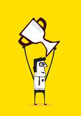 Businessman holding up a trophy