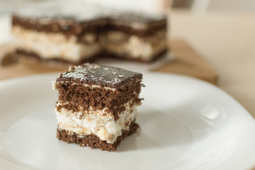 Chocolate cut cake top view. Sweet chocolate pie.