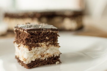 Chocolate cut cake top view. Sweet chocolate pie.
