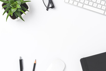 Overhead shot of office desktop with copyspace