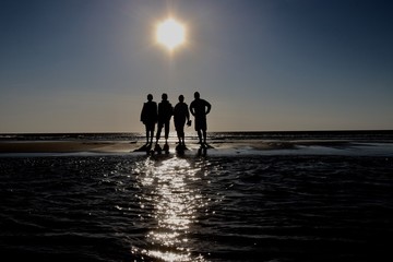 couple on the beach at sunset