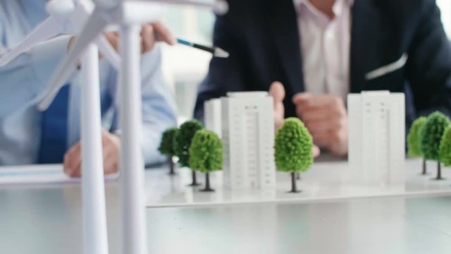 Two businessmen looking for new solutions for architecture 