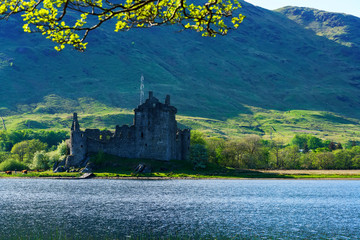 Obraz premium Kilchurn Castle , in the care of Historic Environment Scotland , is a ruined structure on a rocky peninsula at Loch Awe , Argyll and Bute, Scotland