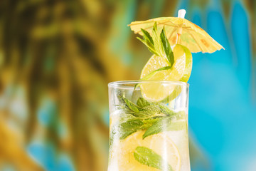 Orange juice with peppermint lime and umbrella