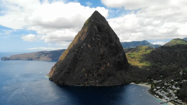 drone view from above at the huge Pitons of Saint Lucia, St Lucia Caribbean at sunset