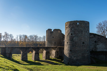 Fototapeta na wymiar medieval fortress in Koporye, side view backlight