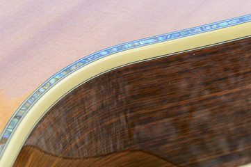 Acoustic Guitar detail - inlay detail on edge curve