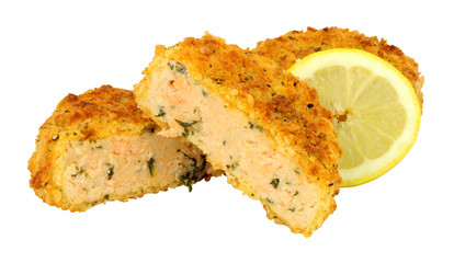 Breadcrumb covered salmon fish cakes isolated on a white background
