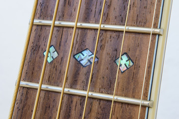 Acoustic Guitar detail - fret inlay close - from below