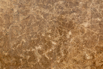 Yellow granite slab closeup background texture.