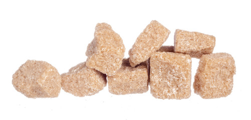 Brown cane sugar cubes isolated on white background