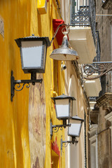 Old street lamps in the old town of the city of Gallipoli, Puglia, Italy