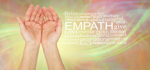 The healing hands of an empath - pair of female hands gently cupped beside an EMPATH word cloud...