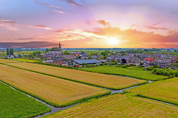 Fototapeta na wymiar Aerial from a traditional dutch village in the countryside from the Netherlands
