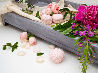 Beautiful composition with pink marshmallows and bright colors. Copy space.