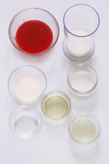 Different ingredients for cooking bakery foods, on white background.