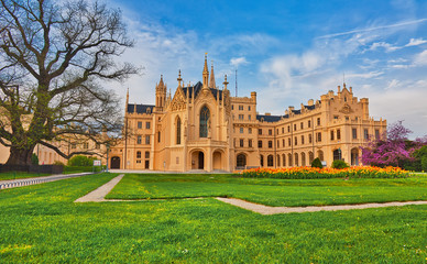 Fototapeta na wymiar LEDNICE, CZECH REPUBLIC - April 23rd, 2018: Lednice castle surrounded by beautiful park in Southern Moravia, popular travel destination