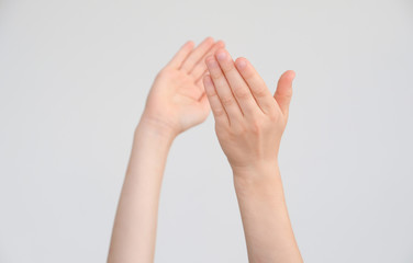 Child's hands clap