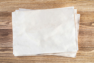 Sheet of paper lying on wooden table