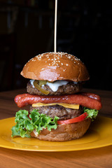 green sesame bun, burger with cutlet and vegetables