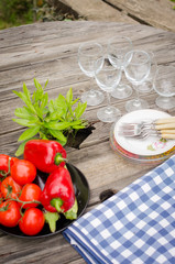 vegetables and dishes on rustic wooden table