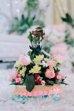 Betel trellis or known as "Sireh Junjung" in Malay culture wedding with nice arrangement over lovely floweriest background