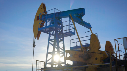 Extraction of oil and gas from the bowels of the earth. Oil rig pumps raw materials