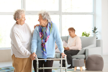 Happy senior women in nursing home - obrazy, fototapety, plakaty