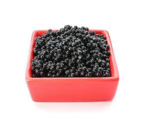 Bowl with delicious black caviar on white background