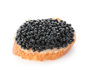 Sandwich with black caviar on white background