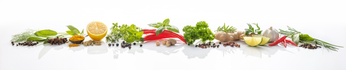 Composition of various herbs and spices on white background