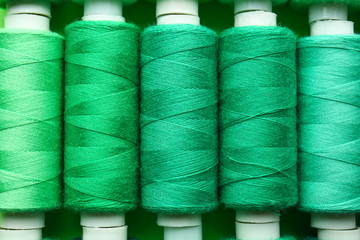 Many sewing threads as background