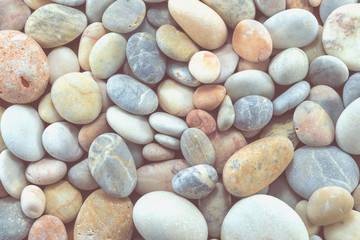 Little stones with grey and pink colors.