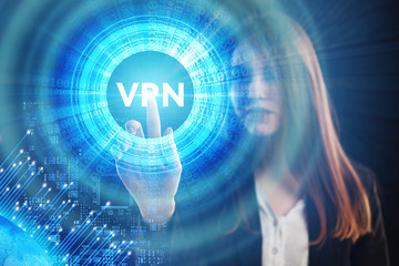 The concept of business, technology, the Internet and the network. A young entrepreneur working on a virtual screen of the future and sees the inscription: VPN