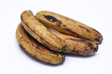 Set of fresh yellow very ripe bananas on white background. Save the food. Recycle and reuse concept. 