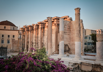 Fototapeta premium temple and columns in the ancient area of Monastiraki near Acropolis at sunset in the capital Greece - Athens.