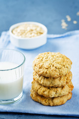 Oatmeal cookies with oats and glass of milk