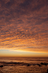 Fototapeta premium Orange sunrise sky over the ocean.