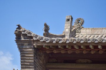 Ancient Chinese Architectural Gateway Wall under Clear Sky and White Cloud, Pingyao County,...