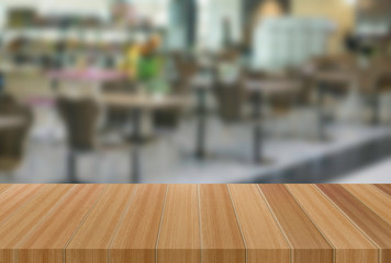 Wooden tables with blurred backgrounds can be used to display or edit to advertise your product.