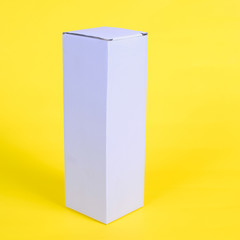 Recycle white cardboard storage box on a color background