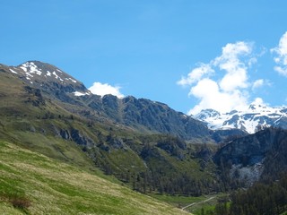 Fototapeta na wymiar The mountains of the Italian Alps, in Val d'aosta, near the village of Chamois, Italy - June 2019.