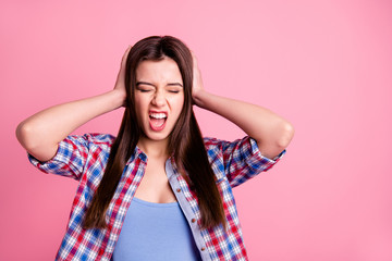 Portrait of sad upset disappointed teen teenager dressed checkered clothes touch palms head headache shout yell close yes isolated pink background good-looking