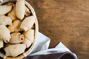 Homemade fresh baked croissants with jam filling for breakfast or snack.