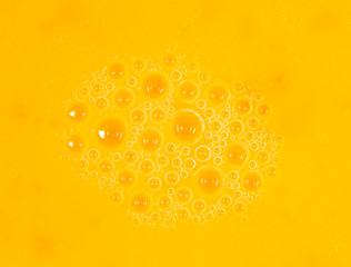 Whipped yolk with eggs as an abstract background