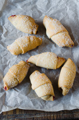 Homemade fresh baked croissants with jam filling for breakfast or snack.
